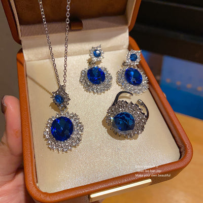 Parure femme style européen et américain : collier ovale serti de strass, boucles d'oreilles raffinées luxe abordable, bague haut de gamme, bijoux assortis à tout pour le bureau