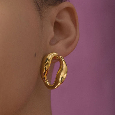 Boucles d'oreilles irrégulières exagérées en forme de U, or 18 carats poli